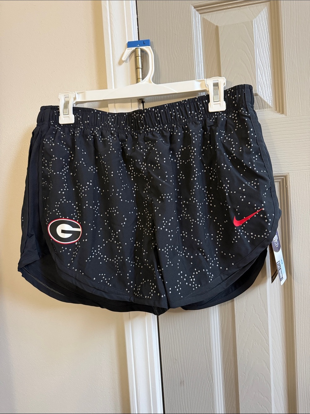 Nike Women’s Black Dotted Athletic Shorts with Red Swoosh